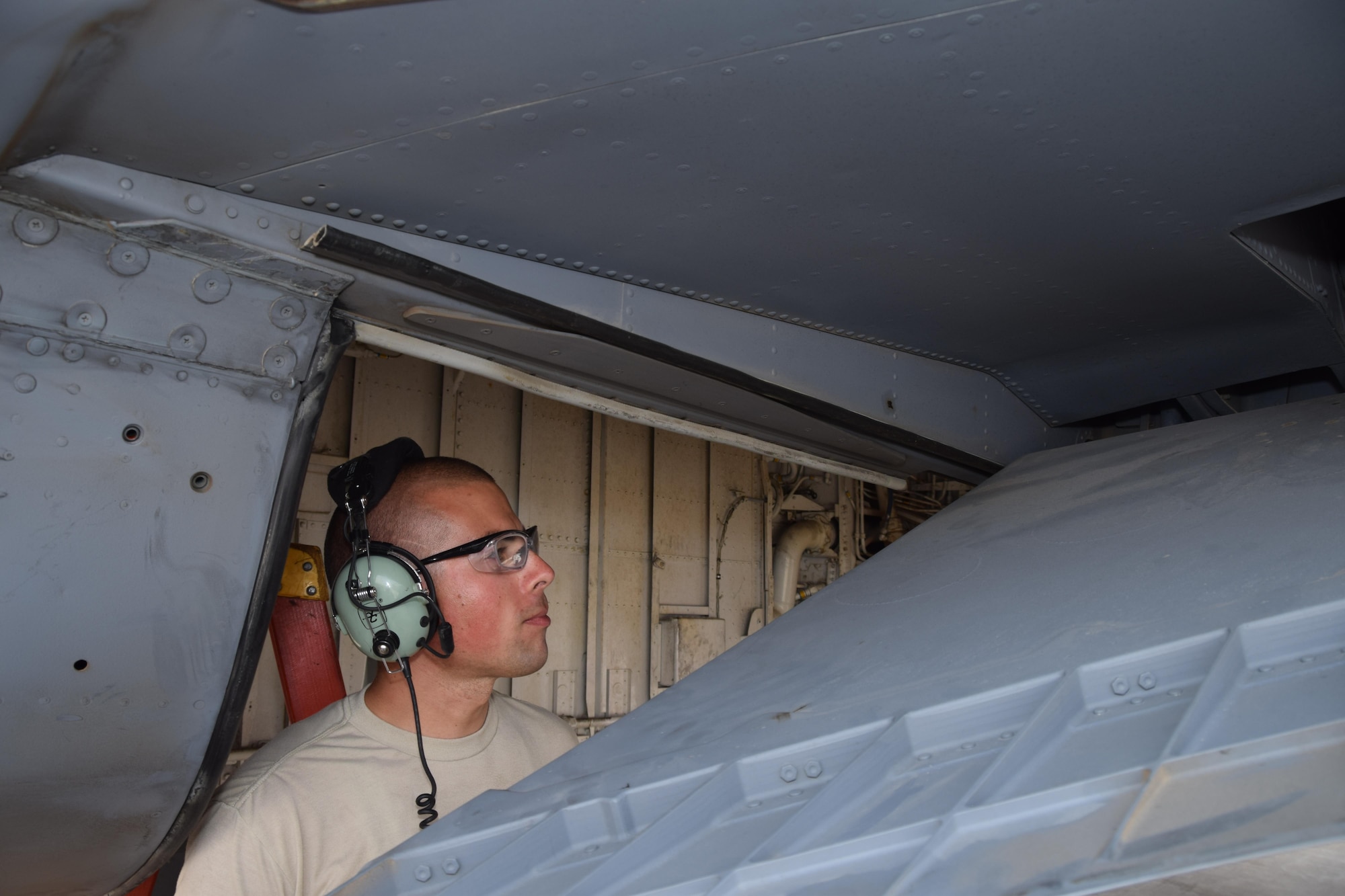 Senior Airman Peter Currier, a crew chief with the 340th Expeditionary Aircraft Maintenance Unit, checks the flaps on a KC-135 Stratotanker June 1, 2016, at Al Udeid Air Base, Qatar. Airmen from the 340th AMU work with more than 60 coalition partners in support of Operation Inherent Resolve and other missions throughout the theater. Currier is stationed at Bangor Air National Guard Base in Bangor, Maine. (U.S. Air Force photo by Technical Sgt. Carlos J. Trevino/Released)