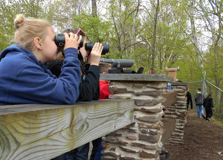 Fourth grade students from Blossburg Elementary School take turns looking at an Osprey nest at Tioga-Hammond and Cowanesque Lakes, May 24, 2016.  The Corps project was one of 186 federal sites selected to receive a 2015 field trip grant from the National Park Foundation (NPF), the official charity of America’s national parks. The grant, part of NPF’s Open OutDoors for Kids Program, supports the White House’s Every Kid in a Park youth initiative, which provides  fourth-grade children and their families a pass granting free access to national parks, forests, and wildlife refuges.