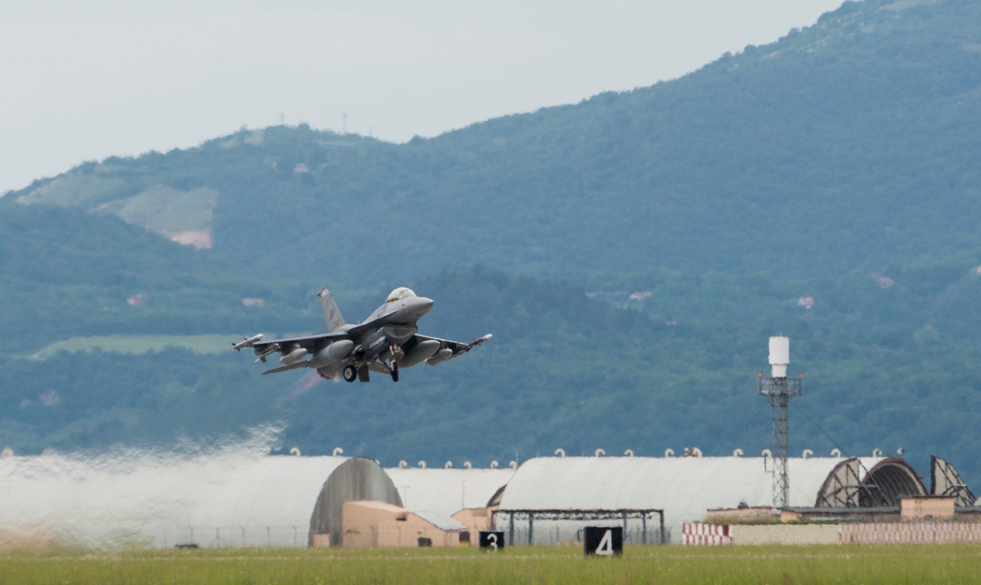 A 510th Fighter Squadron F-16 Fighting Falcon departs Aviano Air Base, Italy, for Lask, Poland, to participate in Aviation Detachment 16-3 in support of Operation Atlantic Resolve, June 1, 2016. U.S. Air Force Airmen from the 31st Fighter Wing will join with U.S. Air National Guardsmen from the 138th Fighter Wing and 239th Combat Communications Squadron to participate in the bilateral training with the Polish air force and NATO and allied nations. (U.S. Air Force photo by Senior Airman Krystal Ardrey/Released)