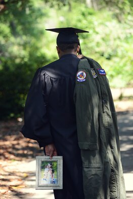 Staff Sgt. Alfonso Rogers, a 701st Airlift Squadron loadmaster at Joint Base Charleston, South Carolina, was recently hired as a sales representative by the Charleston RiverDogs baseball team, a Class A affiliate of the New York Yankees. His new role has been a long time in the making as he began his journey in the sports arena prior to joining the military in 2006.  (Courtesy photo by Nicole Mickle)