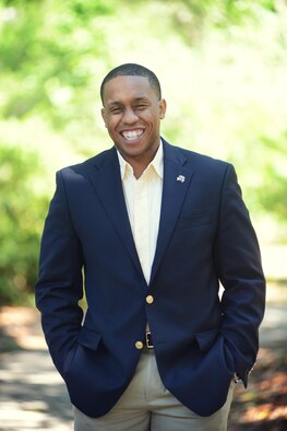 Staff Sgt. Alfonso Rogers, a 701st Airlift Squadron loadmaster at Joint Base Charleston, South Carolina, was recently hired as a sales representative by the Charleston RiverDogs baseball team, a Class A affiliate of the New York Yankees. His new role has been a long time in the making as he began his journey in the sports arena prior to joining the military in 2006.  (Courtesy photo by Nicole Mickle)