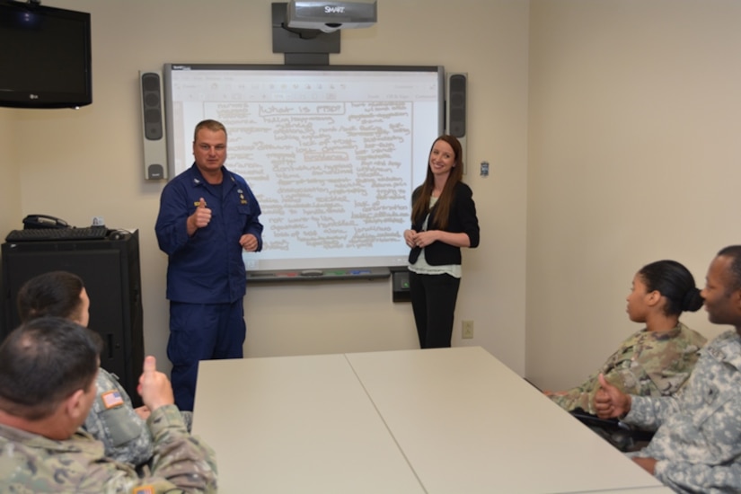 U.S. Public Health Service Capt. Richard Schobitz and Melissa Ramirez conduct a planning meeting for the next session of Brooke Army Medical Center’s Intensive Outpatient Program for Post-Traumatic Stress Disorder, June 2, 2016. Army photo by Robert T. Shields