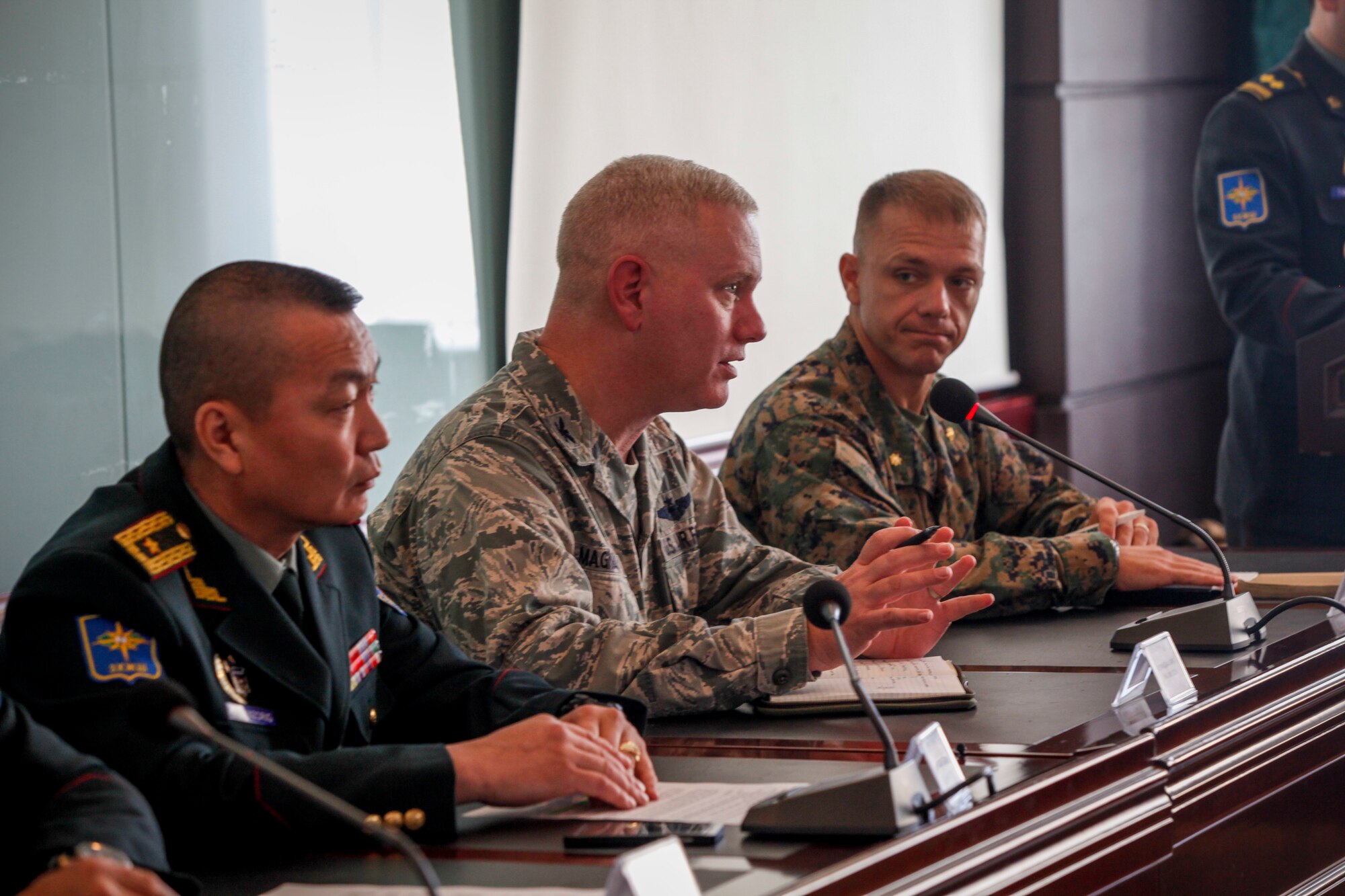 Mongolian Armed Forces Brig. Gen. D.Ganzorig, left, U.S. Air Force Col. Carl Magnusson, center, exercise co-director for Khaan Quest 16 and U.S. Marine Corps Maj. Robert Shuford, answer questions about the exercise at a media engagement at the Ministry of Defense, in Ulaanbatar, Mongolia, May 20, 2016. Khaan Quest is an annual, multinational peacekeeping operations exercise conducted in Mongolia and is the capstone exercise for this year's United Nations Global Peace Operations Initiative program. (U.S. Marine Corps photo by Cpl. Hilda M. Becerra / Released)