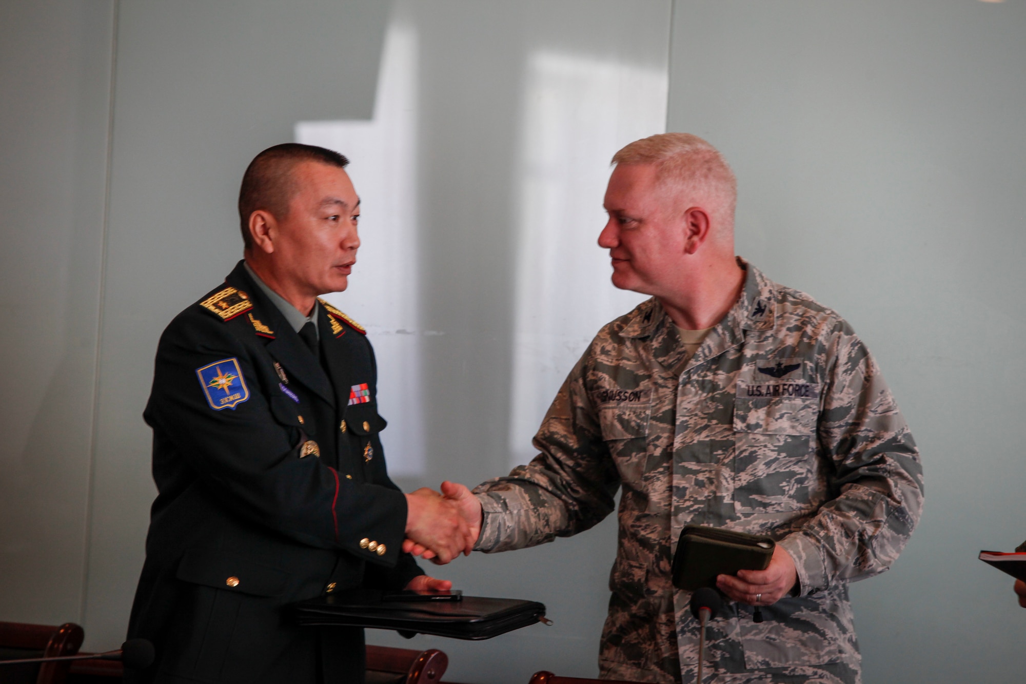 Mongolian Armed Forces Brig. Gen. D.Ganzorig, left, U.S. Air Force Col. Carl Magnusson, center, exercise co-director for Khaan Quest 16 and U.S. Marine Corps Maj. Robert Shuford, answer questions about the exercise at a media engagement at the Ministry of Defense, in Ulaanbatar, Mongolia, May 20, 2016. Khaan Quest is an annual, multinational peacekeeping operations exercise conducted in Mongolia and is the capstone exercise for this year's United Nations Global Peace Operations Initiative program. (U.S. Marine Corps photo by Cpl. Hilda M. Becerra / Released)