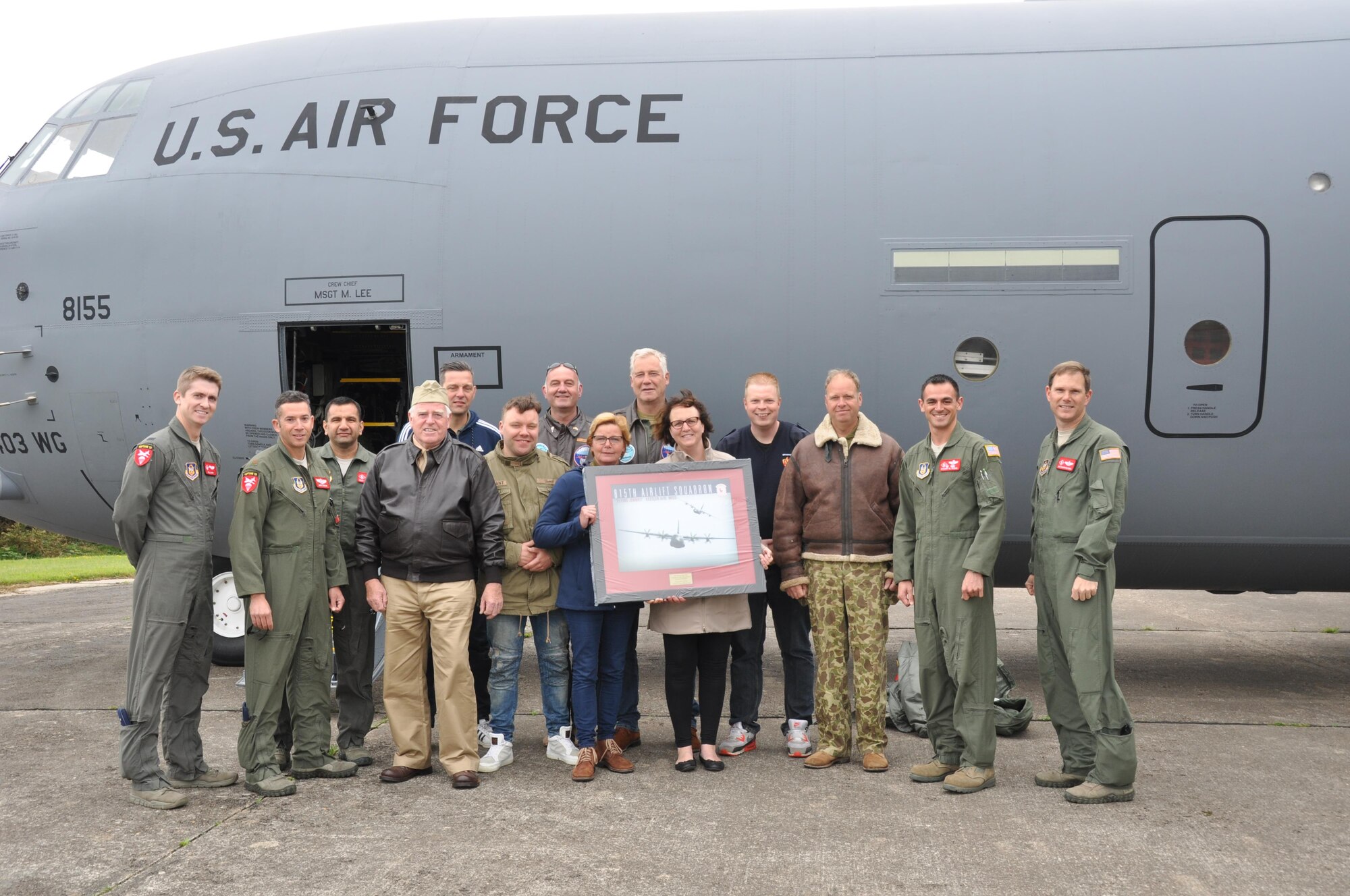 Members of one of the D-Day historical re-enactor groups recieved a tour of the C-130J and a framed print from the 815th Airlift Squadron on June 3, 2016.  More than 380 service members from Europe and affiliated D-Day historical units are participating in the 72nd anniversary as a part of Joint Task Force D-Day 72.  The Task Force,  based in Sainte-Mère-Église, France, is supporting local events across Normandy, from May 30 - 6 June, 2016 to commemorate the selfless actions by all of the allies on D-Day that continue to resonate 72 years later.  (U.S. Air Force photo by Master Sgt. Jessica L. Kendziorek)