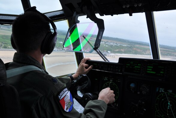 A C-130J Super Hercules aircrew, with the Air Force Reserve's 815th Airlift Squadron, completes flyovers of historical sites in France for the D-Day commemoration June 3, 2016. More than 380 service members from Europe and affiliated D-Day historical units participated in the 72nd anniversary of the World War II invasion. (U.S. Air Force photo/Master Sgt. Jessica L. Kendziorek)