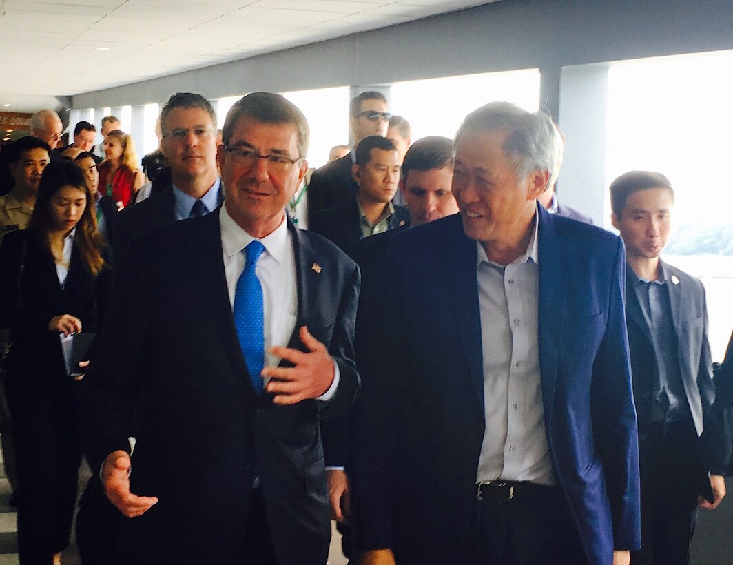 Defense Secretary Ash Carter walks with Singaporean Defense Minister Ng Eng Hen after a press conference in Singapore, June 3, 2016. DoD photo by Amy Forsythe