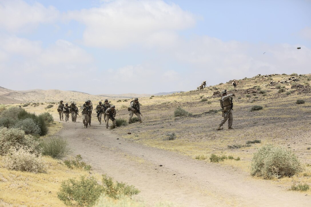 Marines with 1st Battalion, 2nd Marine Regiment, 2nd Marine Division advance down range during the Eager Lion 16 final exercise in Al Quweyrah, Jordan, May 24, 2016. Eager Lion is a recurring exercise between partner nations designed to strengthen military-to-military relationships, increase interoperability, and enhance regional security and stability. (U.S. Marine Corps photo by Cpl. Paul S. Martinez/Released)