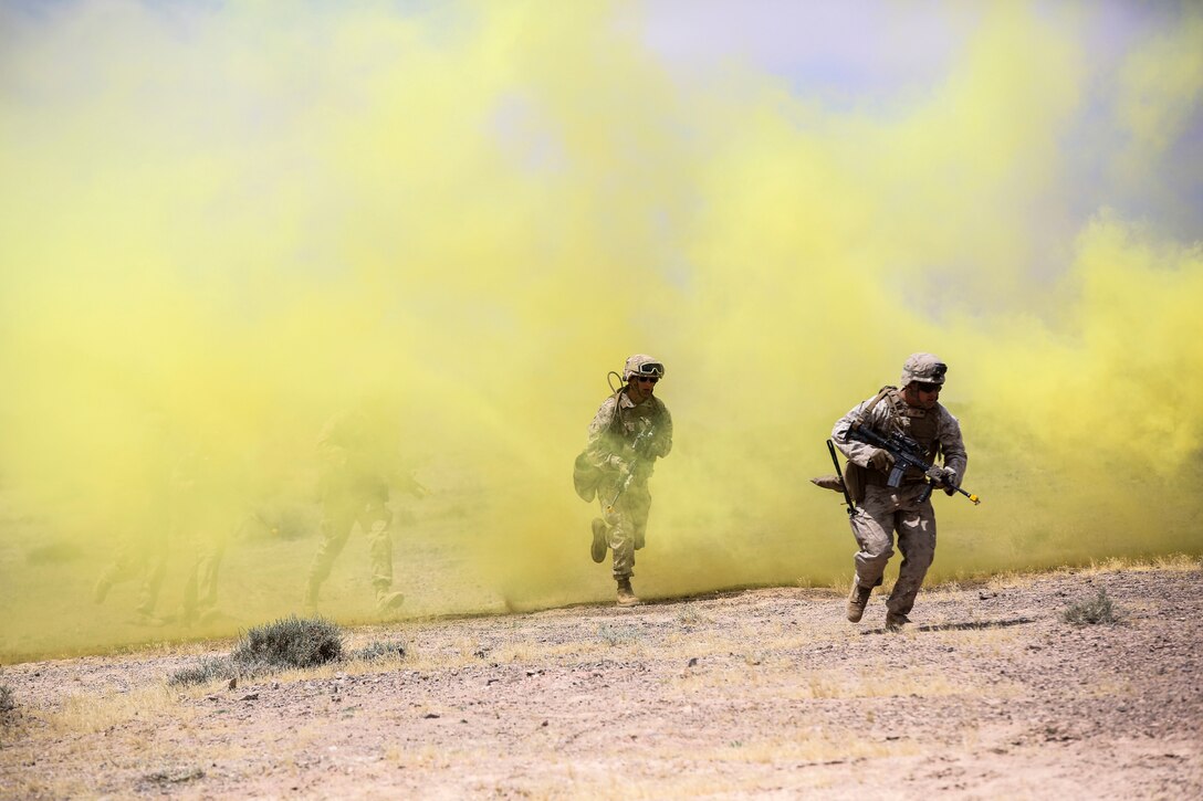 Marines with 1st Battalion, 2nd Marine Regiment, 2nd Marine Division advance down range during the Eager Lion 16 final exercise in Al Quweyrah, Jordan, May 24, 2016. Eager Lion is a recurring exercise between partner nations designed to strengthen military-to-military relationships, increase interoperability, and enhance regional security and stability. (U.S. Marine Corps photo by Cpl. Paul S. Martinez/Released)