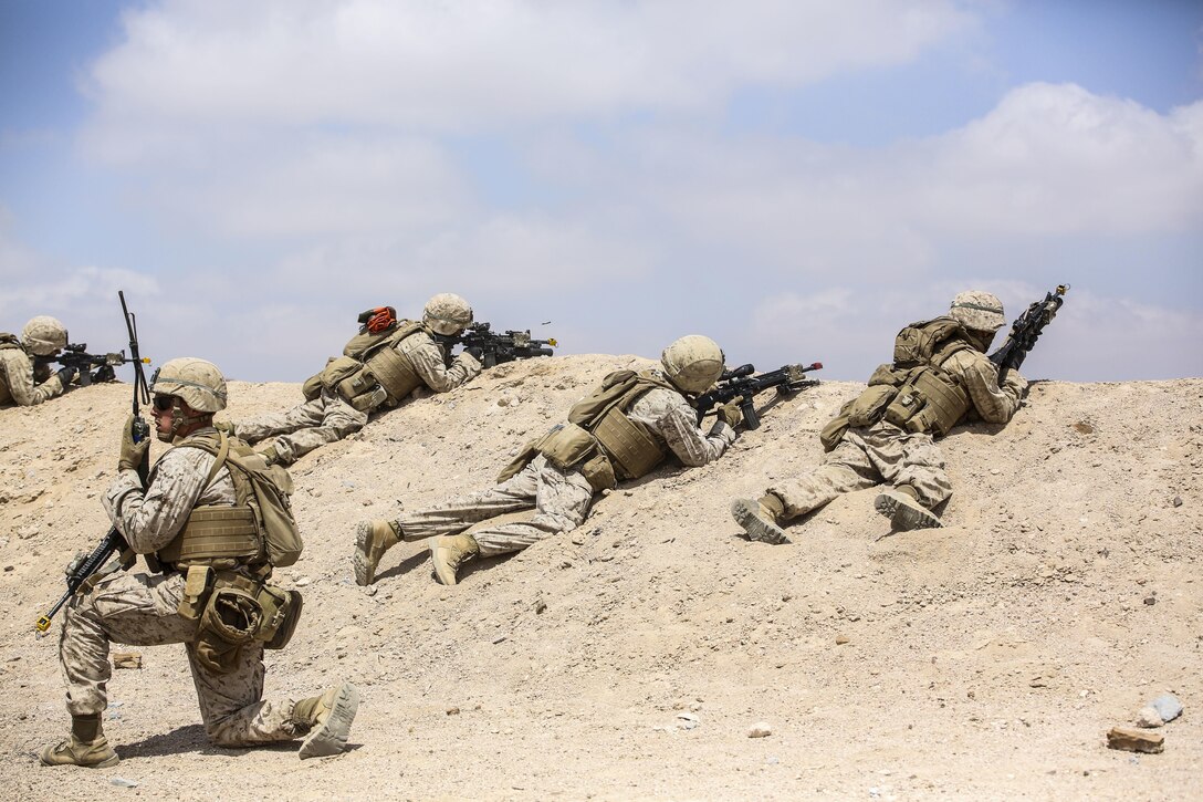 Marines with 1st Battalion, 2nd Marine Regiment, 2nd Marine Division prepare to launch an attack during the Eager Lion 16 final exercise in Al Quweyrah, Jordan, May 24, 2016. Eager Lion is a recurring exercise between partner nations designed to strengthen military-to-military relationships, increase interoperability, and enhance regional security and stability. (U.S. Marine Corps photo by Cpl. Paul S. Martinez/Released)