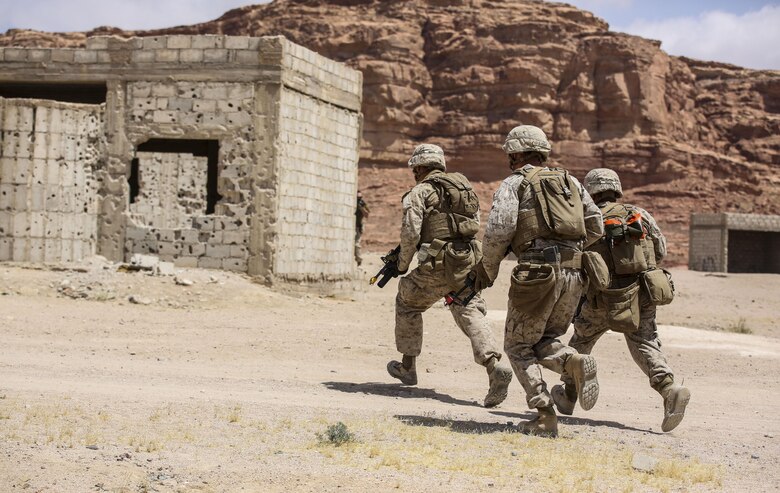 Marines with 1st Battalion, 2nd Marine Regiment, 2nd Marine Division advance down range during the Eager Lion 16 final exercise in Al Quweyrah, Jordan, May 24, 2016. Eager Lion is a recurring exercise between partner nations designed to strengthen military-to-military relationships, increase interoperability, and enhance regional security and stability. (U.S. Marine Corps photo by Cpl. Paul S. Martinez/Released)