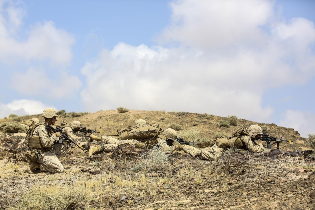 Marines with 1st Battalion, 2nd Marine Regiment, 2nd Marine Division prepare to launch an attack during the Eager Lion 16 final exercise in Al Quweyrah, Jordan, May 24, 2016. Eager Lion is a recurring exercise between partner nations designed to strengthen military-to-military relationships, increase interoperability, and enhance regional security and stability. (U.S. Marine Corps photo by Cpl. Paul S. Martinez/Released)