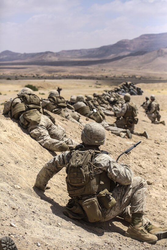 Marines with 1st Battalion, 2nd Marine Regiment, 2nd Marine Division prepare to launch an attack during the Eager Lion 16 final exercise in Al Quweyrah, Jordan, May 24, 2016. Eager Lion is a recurring exercise between partner nations designed to strengthen military-to-military relationships, increase interoperability, and enhance regional security and stability. (U.S. Marine Corps photo by Cpl. Paul S. Martinez/Released)