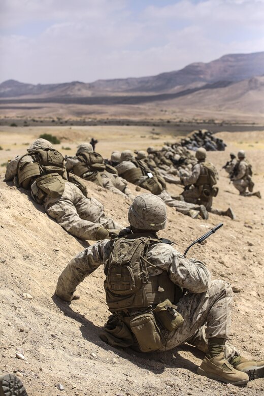 Marines with 1st Battalion, 2nd Marine Regiment, 2nd Marine Division prepare to launch an attack during the Eager Lion 16 final exercise in Al Quweyrah, Jordan, May 24, 2016. Eager Lion is a recurring exercise between partner nations designed to strengthen military-to-military relationships, increase interoperability, and enhance regional security and stability. (U.S. Marine Corps photo by Cpl. Paul S. Martinez/Released)