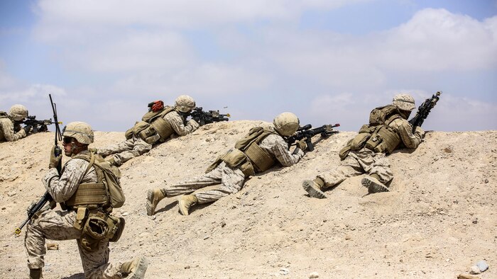 Marines with 1st Battalion, 2nd Marine Regiment, 2nd Marine Division prepare to launch an attack during the Eager Lion 16 final exercise in Al Quweyrah, Jordan, May 24, 2016. Eager Lion is a recurring exercise between partner nations designed to strengthen military-to-military relationships, increase interoperability, and enhance regional security and stability. 