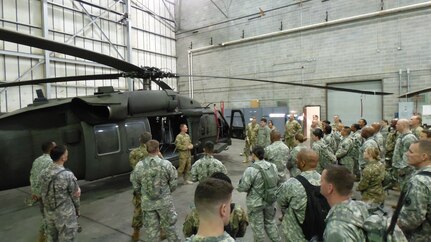 Army Reserve Capt. Richard Nezat, commander of A Company 1st Battalion, 169th Aviation Regiment gives a pre-flight briefing on the UH-60 Black Hawk helicopter to soldiers assigned to the U.S. Army Reserve Command Augmentation Unit (UAU) prior to their land navigation and orienteering exercise during their Battle Assembly on June 4, 2016, at Fort Bragg, N.C. 
After the movement, Soldiers navigated to fixed points using a compass, map and protractor.
The mission of the UAU is to augment United States Army Reserve Command staff during exercises, crisis actions or a presidential selective reserve call-up. Soldiers assigned to the UAU train regularly to provide the most qualified, trained and prepared Soldiers upon request by Army units. (U.S. Army photo by Lt. Col. Kristian Sorensen/released)