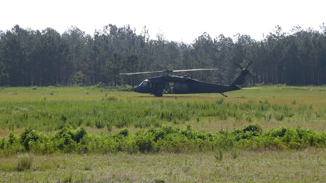 Soldiers assigned to the U.S. Army Reserve Command Augmentation Unit (UAU) arrive at a landing zone aboard Army Reserve UH-60 Black Hawk helicopters assigned to A Company 1st Battalion, 169th Aviation Regiment to perform a land navigation and orienteering exercise during their Battle Assembly on June 4, 2016, at Fort Bragg, N.C. The training required soldiers to navigate to fixed points using a compass, map and protractor.
The mission of the UAU is to augment United States Army Reserve Command staff during exercises, crisis actions, or a presidential selective reserve call-up. Soldiers of the UAU train regularly to provide the most qualified, trained, and prepared Soldiers upon request by Army units. (U.S. Army photo by Lt. Col. Kristian Sorensen/released)