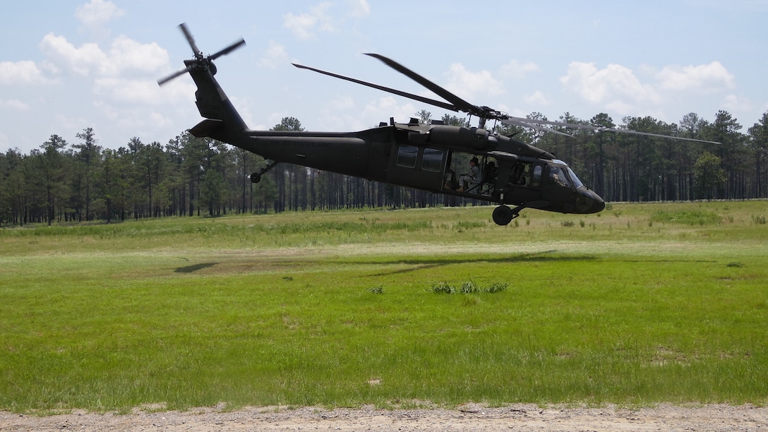 Soldiers assigned to the U.S. Army Reserve Augmentation Unit (UAU) depart the landing zone aboard UH60 “Blackhawk” helicopters assigned to A-Company 1-169 Aviation Regiment of the U.S. Army Reserve following a land navigation and orienteering exercise during their Battle Assembly on June 4, 2016 at Fort Bragg, N.C. The training involved movement to the training are via U.S. Army Reserve "Blackhawk" helicopters then navigating to fixed points using a map, compass and protractor.
The mission of the UAU is to augment United States Army Reserve Command staff during exercises, crisis actions, or a presidential selective reserve call-up. Soldiers of the UAU train regularly to provide the most qualified, trained, and prepared Soldiers upon request by Army units. (U.S. Army photo by Lt. Col. Kristian Sorensen/released)