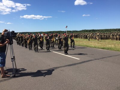 Polish Army band marches in review during an opening ceremony for Exercise Anakonda 2016 at the Drawsko Pomorskie Training Area, Poland, June 6. Exercise Anakonda 2016 is a Polish-led, joint multinational exercise taking place throughout Poland June 7-17. The exercise involves approximately 31,000 participants from more than 20 nations. Exercise Anakonda 2016 is a premier training event for U.S. Army Europe and participating nations and demonstrates the United States and partner nations can effectively unite under a unified command while training on a contemporary scenario. (U.S. Army photo by Timothy L. Hale) (Released)