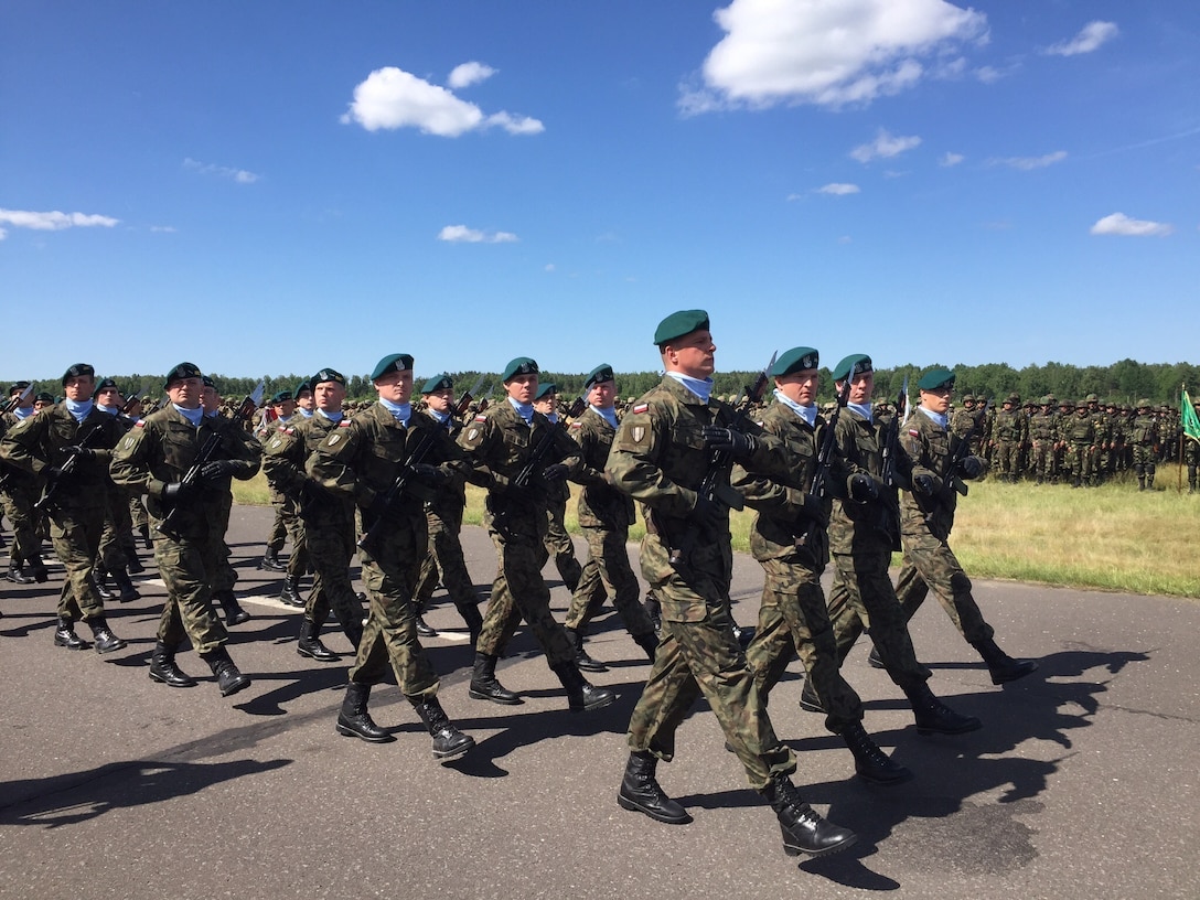 Polish Army soldiers march in review during an opening ceremony for Exercise Anakonda 2016 at the Drawsko Pomorskie Training Area, Poland, June 6. Exercise Anakonda 2016 is a Polish-led, joint multinational exercise taking place throughout Poland June 7-17. The exercise involves approximately 31,000 participants from more than 20 nations. Exercise Anakonda 2016 is a premier training event for U.S. Army Europe and participating nations and demonstrates the United States and partner nations can effectively unite under a unified command while training on a contemporary scenario. (U.S. Army photo by Timothy L. Hale) (Released)