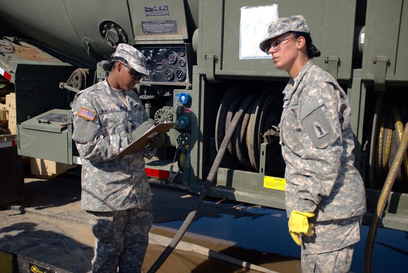 Spc. Tatiana Watler, left, and Sgt. Melissa Vega, petroleum supply specialists with the U.S. Army Reserve's 716th Quartermaster Company, Jersey City, N.J., monitor fuel distribution at the fuel farm during Exercise Anakonda 16 at the Drawsko Pomorskie Training Area, Poland, June 4, 2016. Anakonda 16 is a Polish-led, joint multinational exercise taking place throughout Poland June 7-17. The 716th is the first U.S. Army Reserve unit to operate a fuel farm in Poland. The exercise involves more than 25,000 participants from more than 20 nations. Anakonda 16 is a premier training event for U.S. Army Europe and participating nations and demonstrates the United States and partner nations can effectively unite under a unified command while training on contemporary scenario. (U.S. Army photo by Timothy L. Hale) (Released)