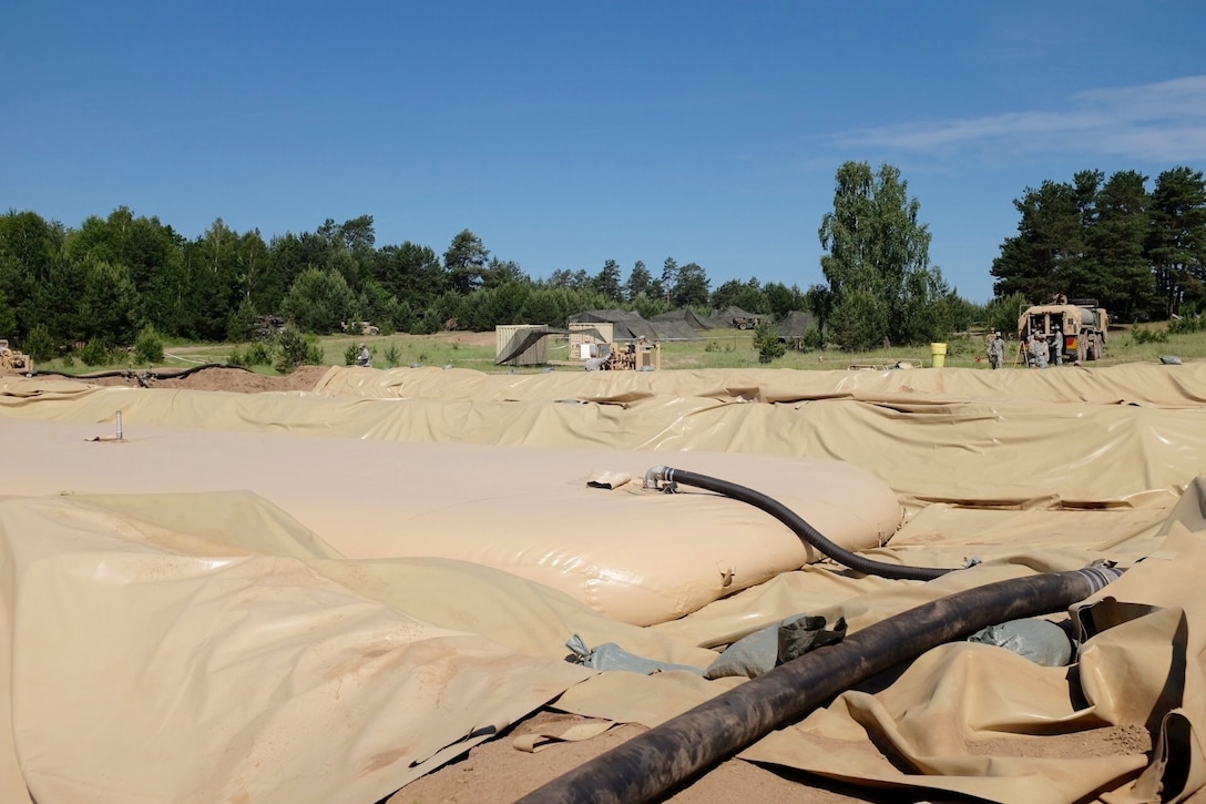 This 150,000-gallon bulk fuel farm is being operated and maintained by the U.S. Army Reserve's 716th Quartermaster Company, Jersey City, N.J., during Exercise Anakonda 2016 at the Drawsko Pomorskie Training Area, Poland, June 4, 2016. Exercise Anakonda 2016 is a Polish-led, joint multinational exercise taking place throughout Poland June 7-17. The 716th is the first U.S. Army Reserve unit to operate a fuel farm in Poland. The exercise involves more than 25,000 participants from more than 20 nations. Exercise Anakonda 2016 is a premier training event for U.S. Army Europe and participating nations and demonstrates the United States and partner nations can effectively unite under a unified command while training on contemporary scenario. (U.S. Army photo by Timothy L. Hale) (Released)