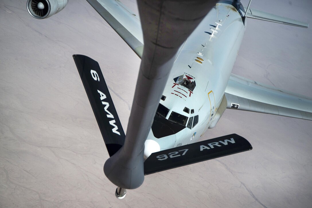 An Air Force E-3 Sentry aircraft approaches the refueling boom of a KC-135 Stratotanker during a refueling mission over Iraq in support of Operation Inherent Resolve, May 31, 2016. Air Force photo by Staff Sgt. Larry E. Reid Jr.