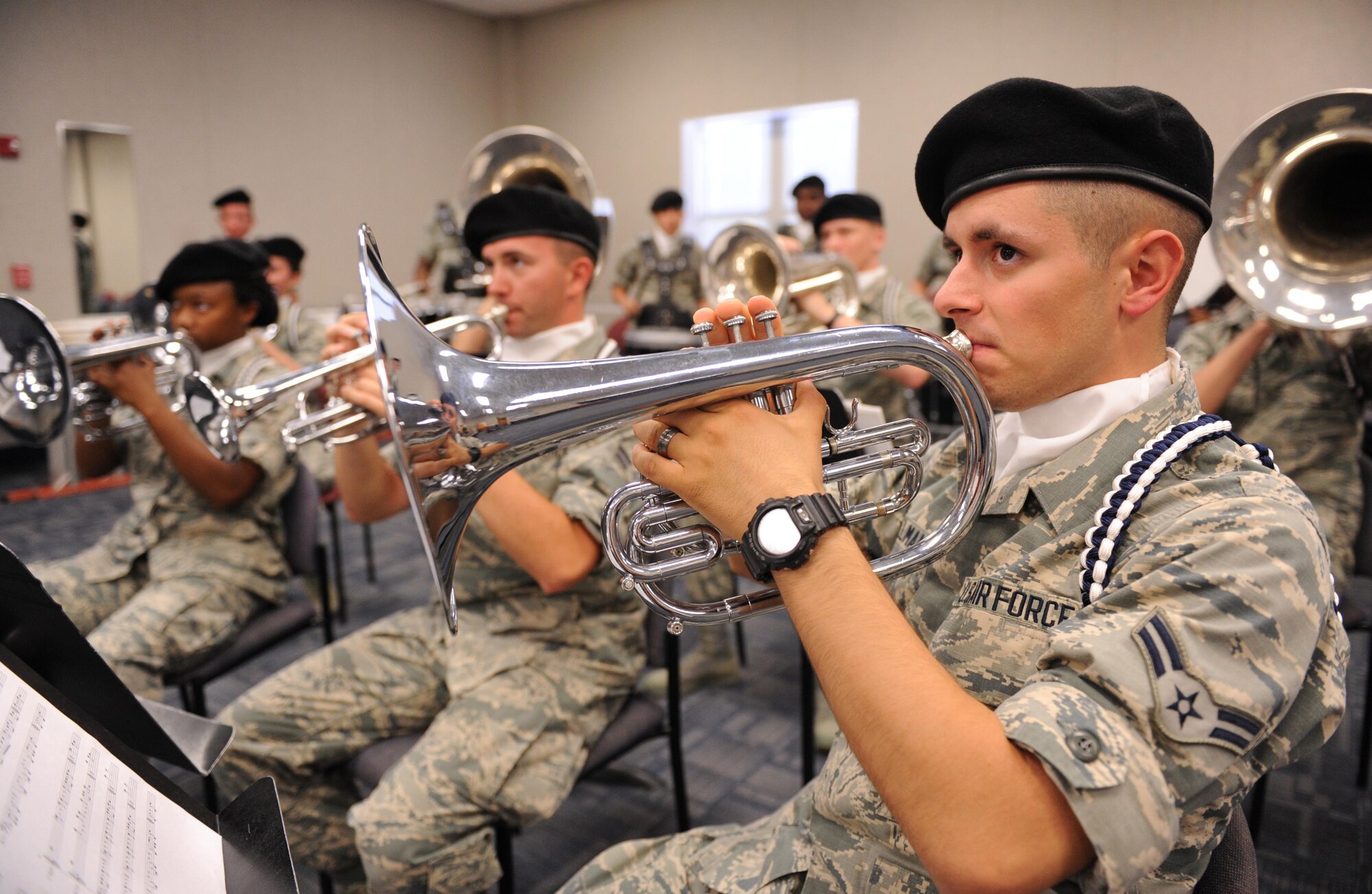 Airman 1st Class John Willman, 81st Training Wing Drum and Bugle Corps mellophone player, plays a musical piece during a practice session at the Levitow Training Support Facility May 31, 2016, Keesler Air Force Base, Miss. The drum and bugle corps performs at various events such as 81st Training Group student parades and drill downs in addition to attending Air Force specialty code technical training on a daily basis. (U.S. Air Force photo by Kemberly Groue)