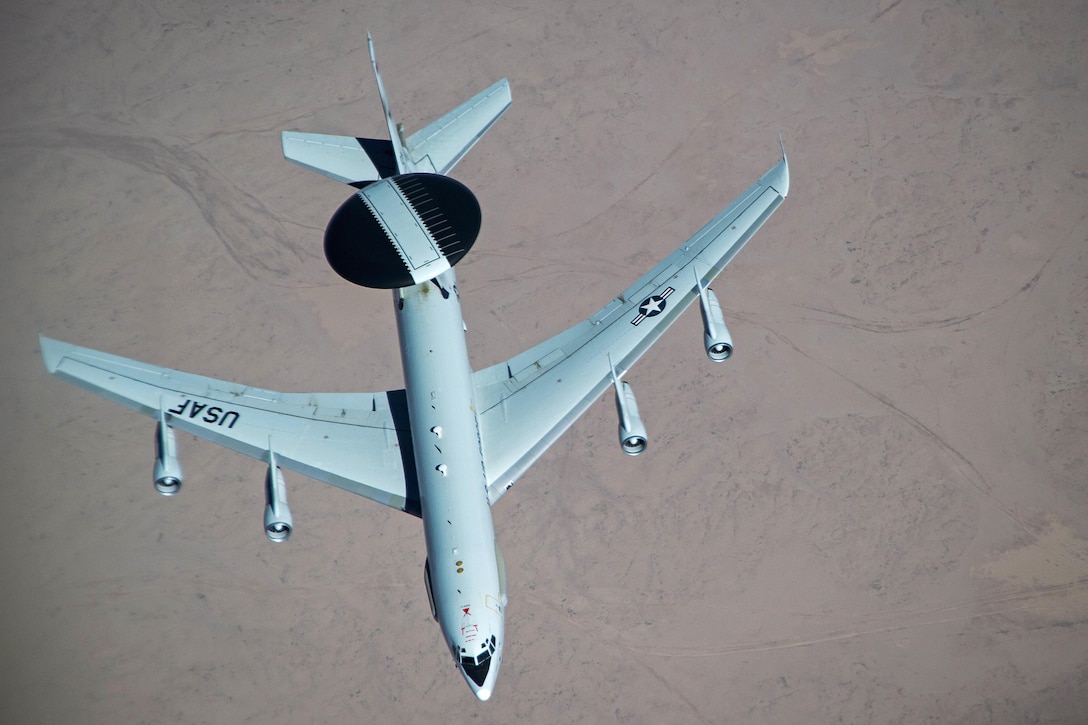 An Air Force E-3 Sentry completes refueling from a KC-135 Stratotanker aircraft over Iraq in support of Operation Inherent Resolve, May 31, 2016. Air Force photo by Staff Sgt. Larry E. Reid Jr.