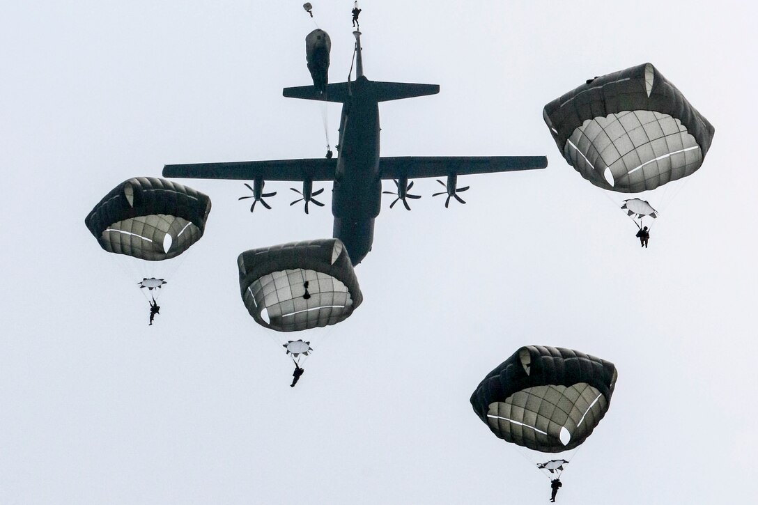 U.S., French and German paratroopers jump into Sainte Mere Eglise, France, June 5, 2016, to commemorate the 72nd anniversary of D-Day. The U.S. soldiers, among the 320 paratroopers from the three countries to participate, are assigned to the 82nd Airborne Division. Army photo by Capt. Joe Bush