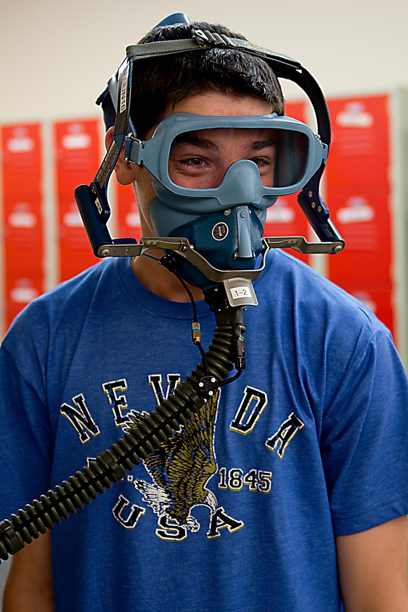 Mason Estle, a student at Northwestern Middle School, tries on a quick-don mask during a base tour May 18, 2016 at Grissom Air Reserve Base, Ind. The students had the opportunity to get out of the classroom and see the 434th Aircrew Flight Equipment and one of Grissom’s KC-135R Stratotanker aircraft. (U.S. Air Force photo/Senior Airman Dakota Bergl) 
