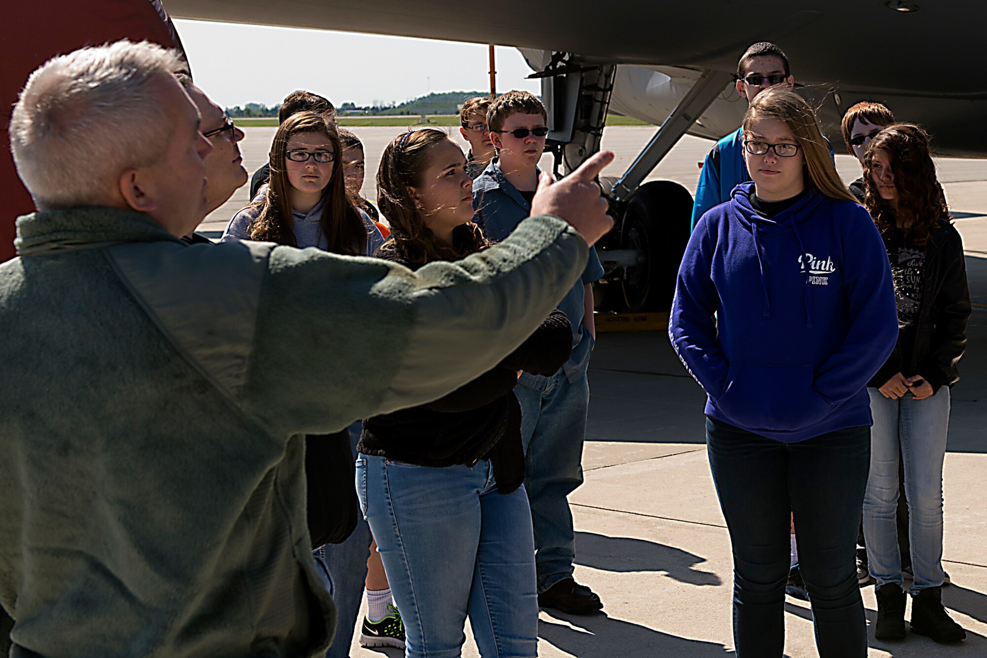 Students from Northwestern Middle School are told about Grissom’s KC-135R Stratotanker aircraft by a 434th Aircraft Maintenance Squadron crew chief during a base visit May 18, 2016 at Grissom Air Reserve Base, Ind. The visit was part of Grissom’s community outreach program and allowed the students an inside look at Grissom's mission. (U.S. Air Force photo/Senior Airman Dakota Bergl)