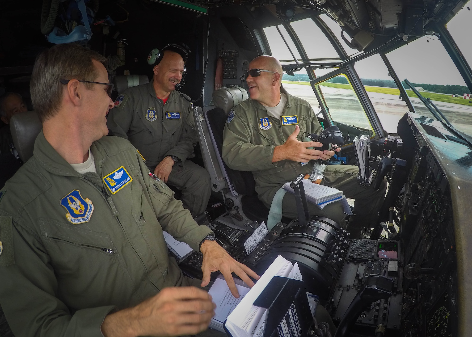 Col. Brent Merritt, 94th Airlift Wing vice commander; Chief Master Sgt. Terry Studstill, 700th Airlift Squadron Flight Engineer superintendent; and Lt. Col. Brian Ferguson, 94th Operations Support Squadron commander, prepare for flight at Dobbins Air Reserve Base, Ga., on June 4, 2016. This was Merritt's last flight as an Air Force Reservist before he retired. (US Air Force Photo by Senior Airman Miles Wilson) 