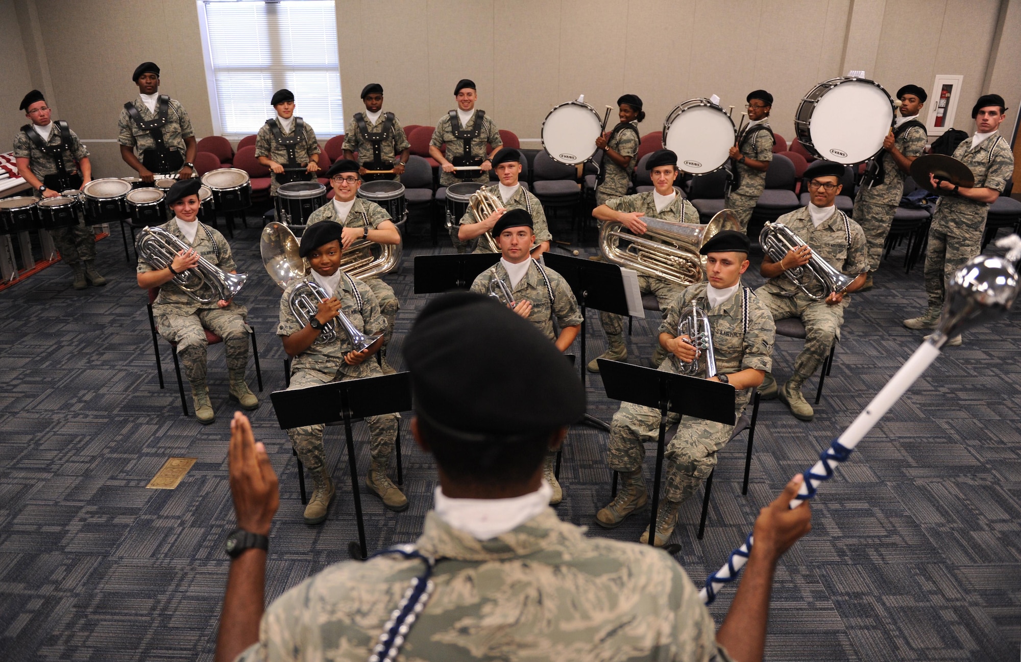 The 81st Training Wing Drum and Bugle Corps poses for a group photo during a practice session at the Levitow Training Support Facility May 31, 2016, Keesler Air Force Base, Miss. The drum and bugle corps performs at various events such as 81st Training Group student parades and drill downs in addition to attending Air Force specialty code technical training on a daily basis. (U.S. Air Force photo by Kemberly Groue)