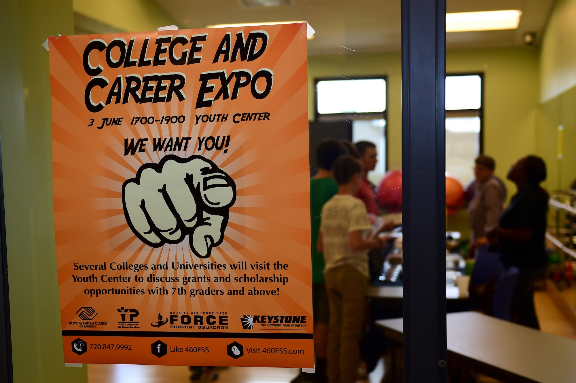 A College and Career Expo poster hangs on a window June 3, 2016, at the youth center on Buckley AFB, Colo. The expo provided Buckley AFB youth with the opportunity to interact with future employers and explore options for after high school. (U.S. Air Force photo by Airman 1st Class Gabrielle Spradling/Released)