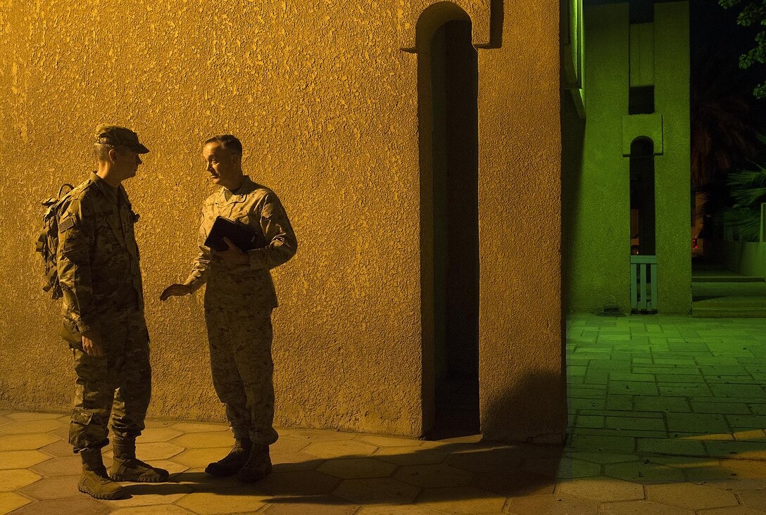 Army Lt. Gen. Sean MacFarland, left, Combined Joint Task Force Operation Inherent Resolve commander, talks with Marine Corps Gen. Joe Dunford, chairman of the Joint Chiefs of Staff, after a meeting in Baghdad, Oct. 20, 2015. MacFarland is the U.S. point person for coordinating the campaign to counter the Islamic State of Iraq and the Levant with Iraqi officials. DoD photo by D. Myles Cullen