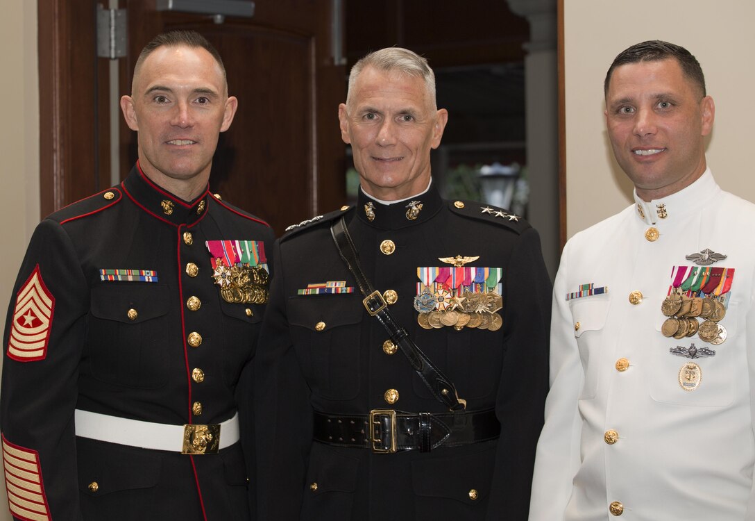 (From left) Sergeant Major, Marine Forces Reserve Sgt. Maj. Patrick Kimble; Commander, Marine Forces Reserve Lt. Gen. Rex C. McMillian; and Command Master Chief, Marine Forces Reserve Master Chief Petty Officer Christopher Kotz attend a reception in Truman-Crawford Hall prior to an Evening Parade at Marine Barracks, Washington, D.C., (“8th & I”), June 3, 2016.