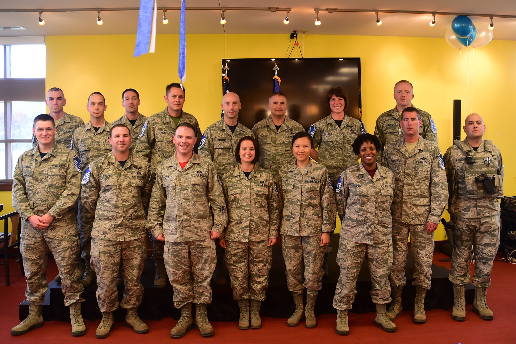 Sixteen Master Sgt. selects stand together June 3, 2016, at the Panther Den on Buckley Air Force Base, Colo. The rank of Master Sgt. is the first in the senior non-commissioned officer ranks and signifies a significant accomplishment in an enlisted Airman’s career. (U.S. Air Force photo by Airman 1st Class Luke W. Nowakowski/Released)