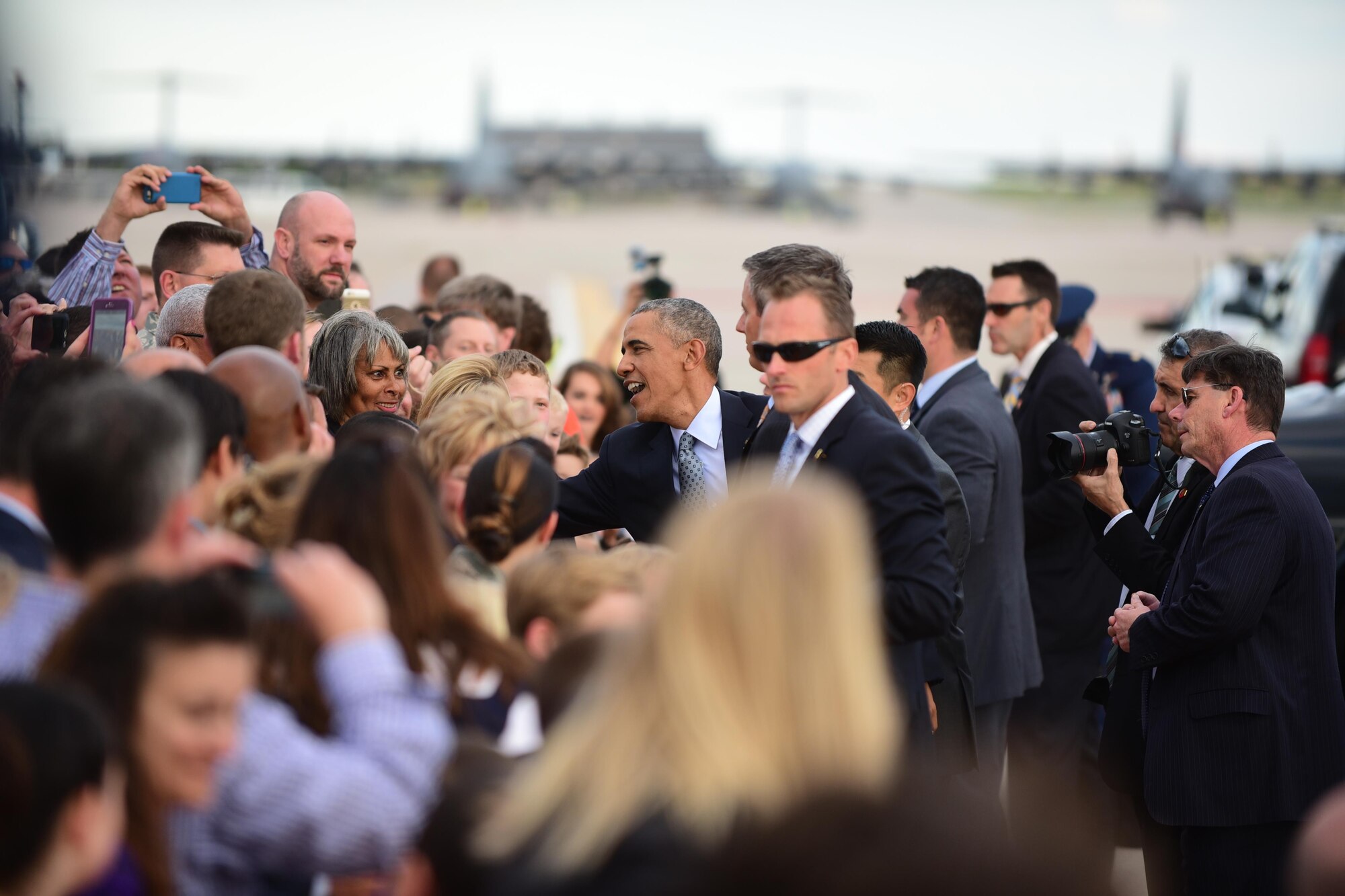 President Barack Obama is greeted by a crowd as he arrives at Peterson Air Force Base, Colo., June 1, 2016. Obama delivered the commencement speech at the 2016 Air Force Academy graduation June 2, 2016. (U.S. Air Force photo by Staff Sgt. Amber Grimm)