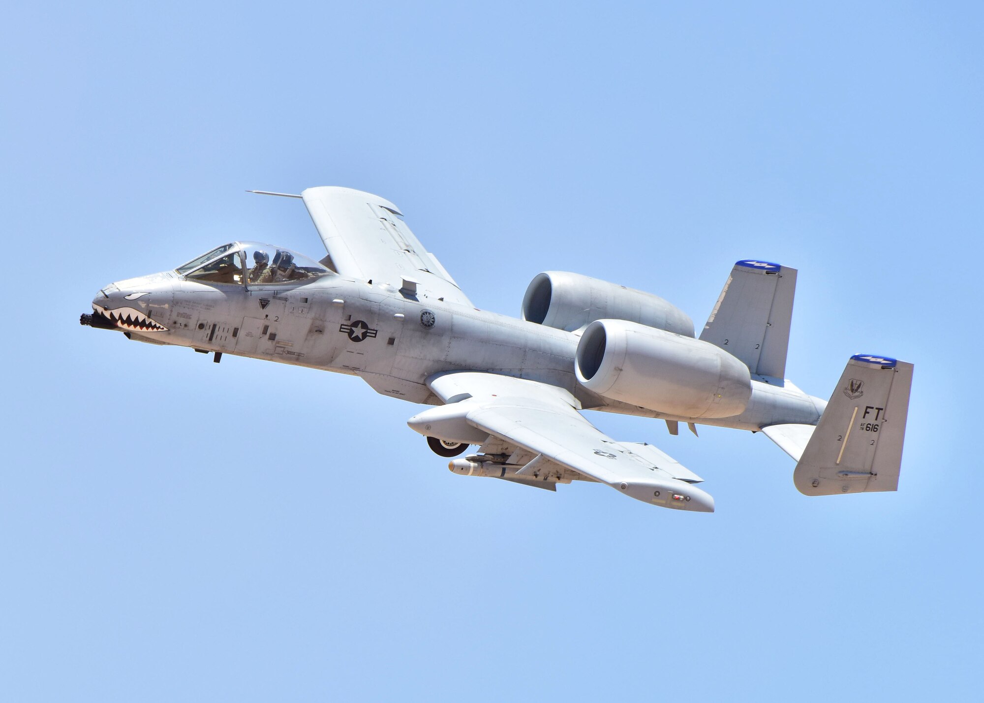 An A-10C Thunderbolt II assigned to the 23rd Fighter Group, Moody Air Force Base, Ga., banks left after performing a low-angle strafe during the Hawgsmoke 2016 competition at the Barry M. Goldwater Range, Ariz., June 2, 2016. The competition took place over the course of two days and included individual and team scoring of strafing, high-altitude dive-bombing, Maverick missile precision and team tactics. (U.S. Air Force photo by Tech. Sgt. Louis Vega Jr.)