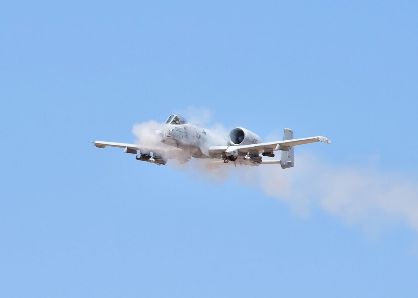 An A-10C Thunderbolt II assigned to the 924th Fighter Group performs a low-angle strafe during the 2016 Hawgsmoke competition at the Barry M. Goldwater Range, Ariz., June 2, 2016. Hawgsmoke is a biennial competition focused on tactics the A-10C can employ during combat operations. (U.S. Air Force photo by Tech. Sgt. Louis Vega Jr.)