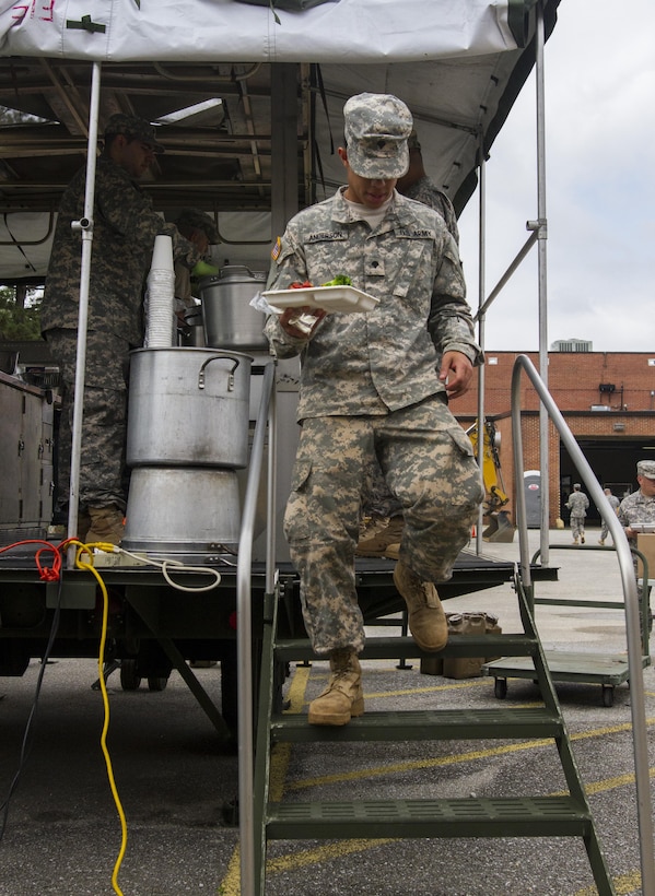 Culinary specialists assigned to the 200th Military Police Command take out their Mobile Kitchen Trailer (MKT) and prepare lunch during the unit’s battle assembly at Fort Meade, Maryland, on June 4, 2016. The command’s goal is to have each of its units become proficient with their MKT so when they have to mobilize they are ready and prepared to use it. (U.S. Army photo by Spc. Stephanie Ramirez) 