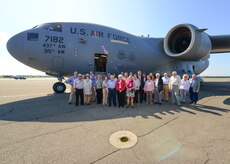Members of the Defense Orientation Conference Association pose in front of a Globemaster III C-17 aircraft during their tour of Joint Base Charleston, S.C. June 1, 2016.  While visiting, DOCA members received a JB Charleston command mission brief, SPAWAR command brief and 841st Transportation Battalion command brief, interacted with Airmen and Sailors, viewed static equipment displays, and took a JB Charleston - Weapons Station driving tour.