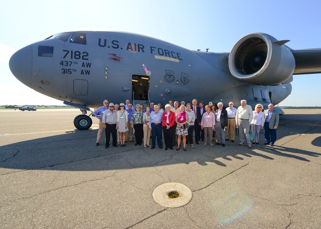 Members of the Defense Orientation Conference Association pose in front of a Globemaster III C-17 aircraft during their tour of Joint Base Charleston, S.C. June 1, 2016.  While visiting, DOCA members received a JB Charleston command mission brief, SPAWAR command brief and 841st Transportation Battalion command brief, interacted with Airmen and Sailors, viewed static equipment displays, and took a JB Charleston - Weapons Station driving tour.