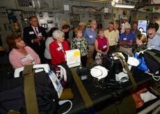 Members of the Defense Orientation Conference Association are briefed about a 315th Aeromedical Evacuation Squadron capabilities with a static display aboard a Globemaster III C-17 aircraft during their tour of Joint Base Charleston, S.C. June 1, 2016.  While visiting, DOCA members received a JB Charleston command mission brief, SPAWAR command brief and 841st Transportation Battalion command brief, interacted with Airmen and Sailors, viewed static equipment displays and took a JB Charleston - Weapons Station driving tour.