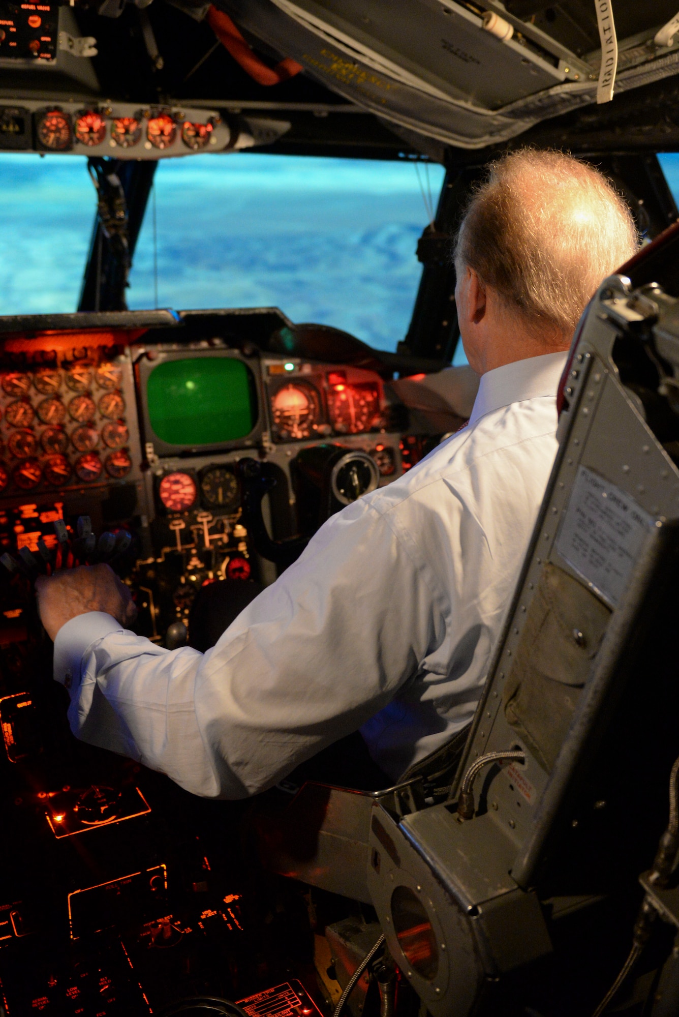 Robert “Rocky” Bleier, a Vietnam veteran and former Pittsburg Steelers football player, operates the B-52 Stratofortress flight simulator at Minot Air Force Base, N.D., during his visit May 26, 2016. During the simulation, Bleier took off and landed in Las Vegas, Nev., attempted in-flight refueling and performed aerial stunts.  (U.S. Air Force photo/Airman 1st Class Jessica Weissman)
