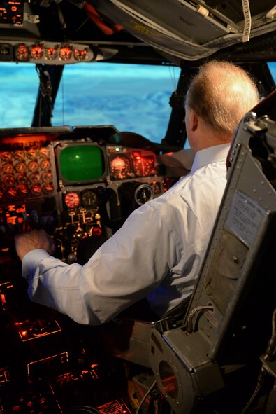 Robert “Rocky” Bleier, a Vietnam veteran and former Pittsburg Steelers football player, operates the B-52 Stratofortress flight simulator at Minot Air Force Base, N.D., during his visit May 26, 2016. During the simulation, Bleier took off and landed in Las Vegas, Nev., attempted in-flight refueling and performed aerial stunts.  (U.S. Air Force photo/Airman 1st Class Jessica Weissman)