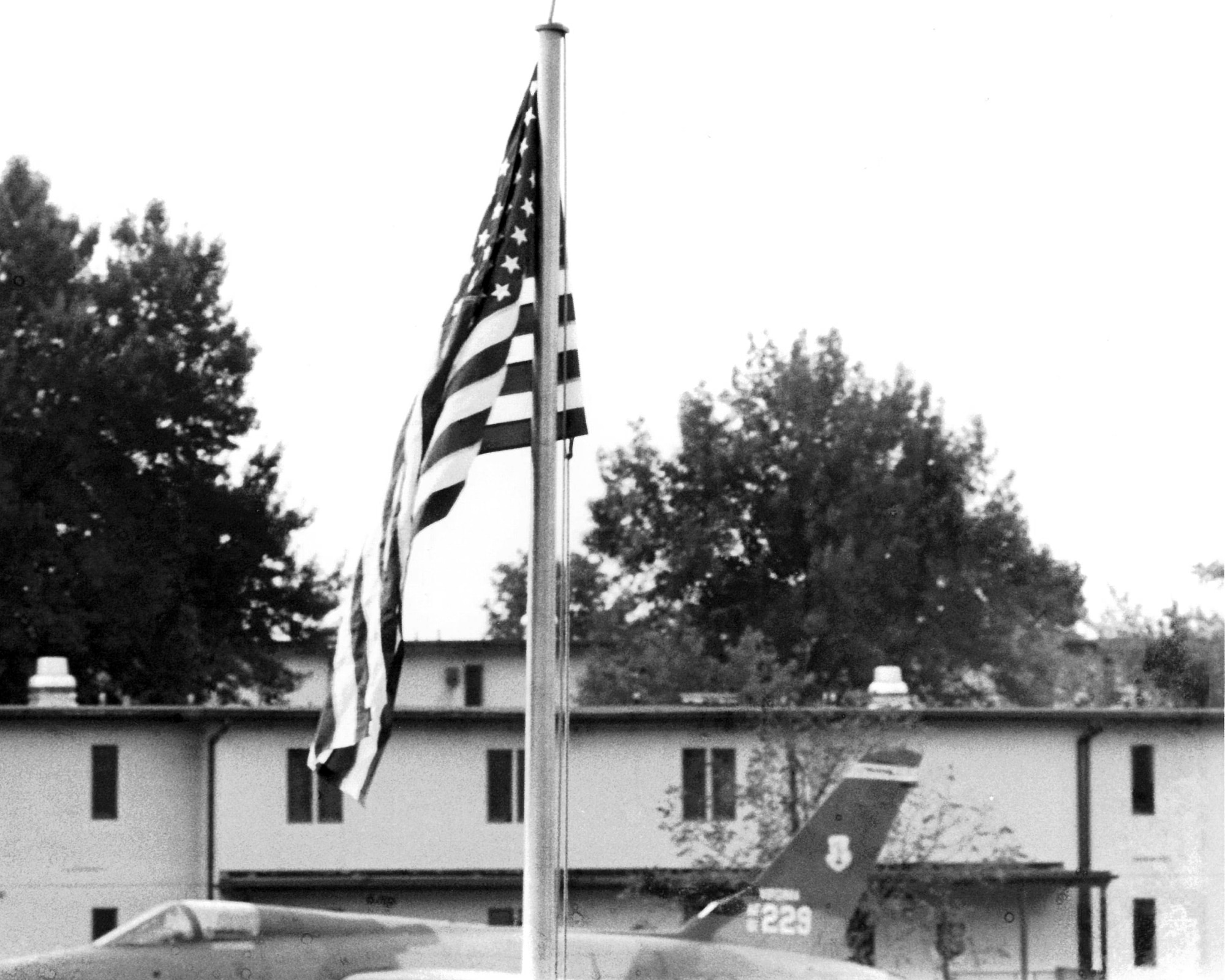The American flag is flown July 29, 1986, during the first reveille of Air Force NCO academy class 86-3 at the I.G. Brown Training and Education Center in Louisville, Tenn. The event closed a 16-year journey to fly over the capitols of every state and territory in the United States. It was sent out by NCO academy class 71-1. (U.S. Air National Guard file photo/released)  