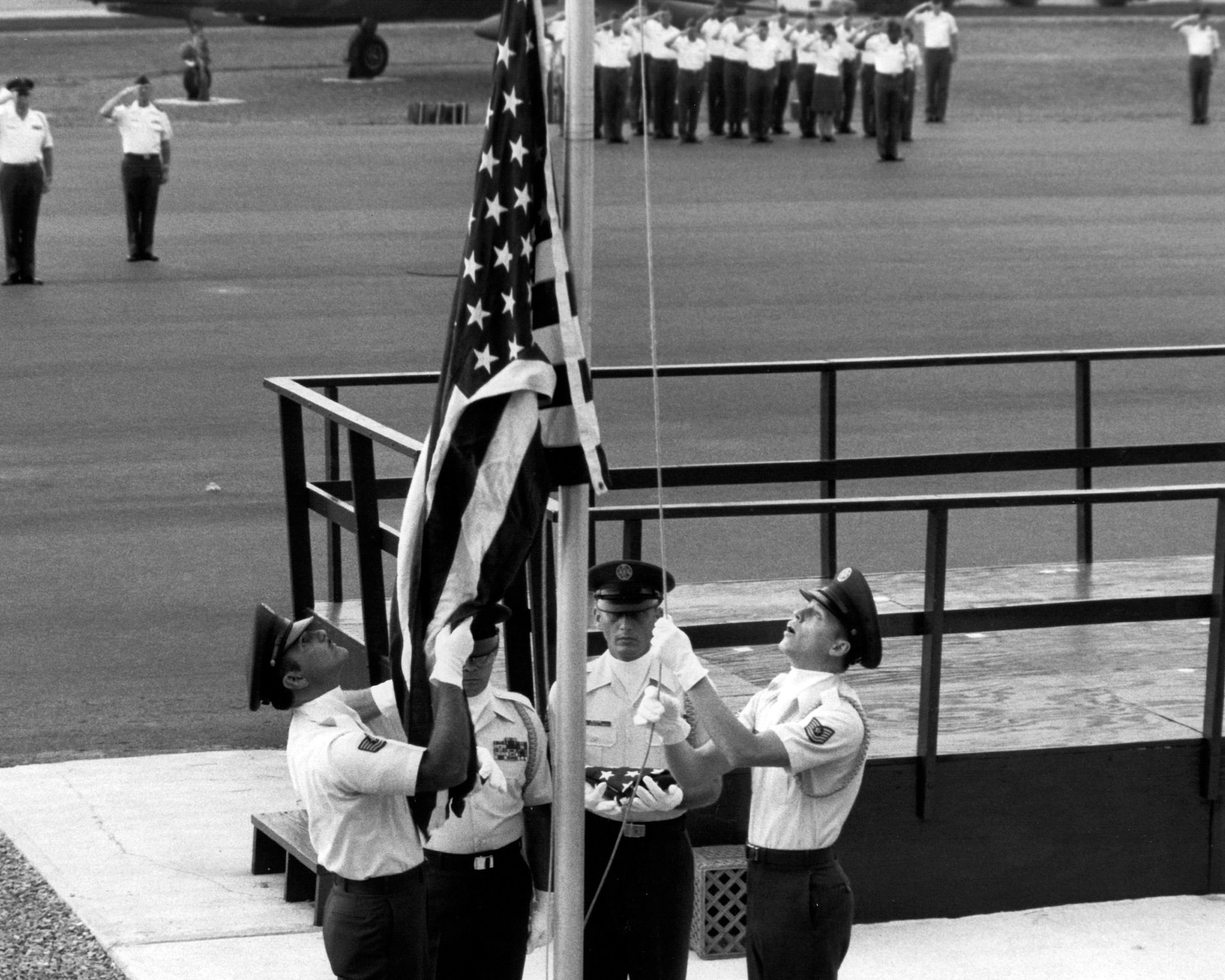 The American flag on display at the I.G. Brown Training and Education Center's Spruance Hall in Louisville, Tenn., is last flown July 29, 1986, at the first reveille of NCO academy class 86-3. The flag took a 16-year journey to fly over the capitols of every state and territory in the United States. It was sent out by NCO academy class 71-1. (U.S. Air National Guard file photo/released)  