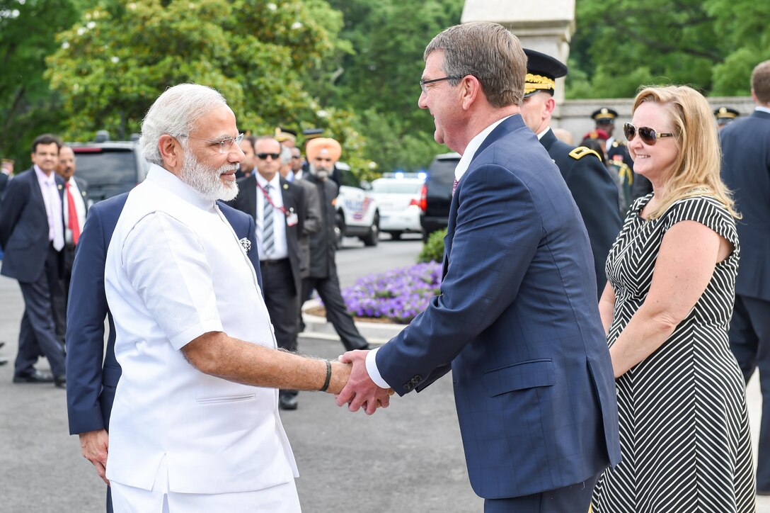 Defense Secretary Ash Carter greets Indian Prime Minister Narendra Modi before a wreath-laying ceremony at Arlington National Cemetery, Va., June 6, 2016. DoD photo by Army Sgt. 1st Class Clydell Kinchen
